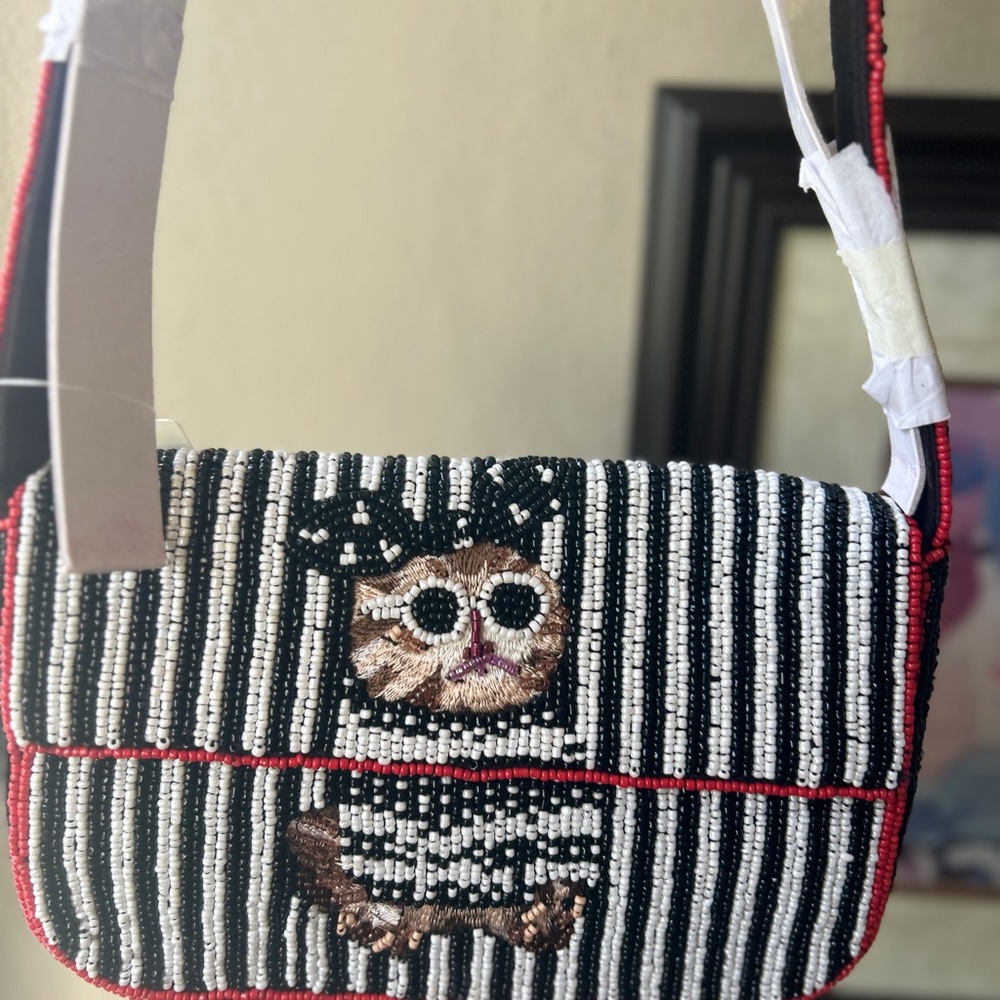 Cute!! Striped Black and White Beaded Cat Bag Anthropologie.